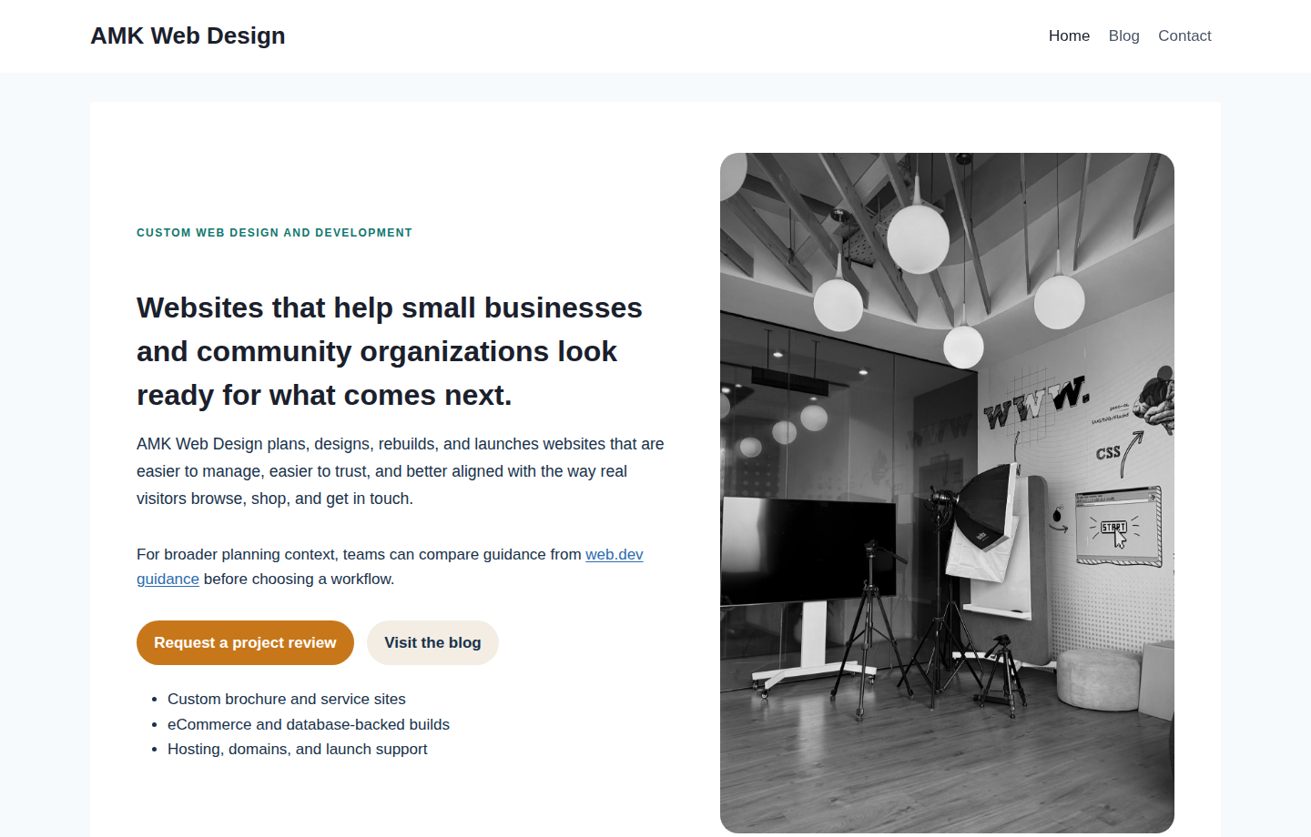 AMK Web Design homepage header with a clear primary navigation menu