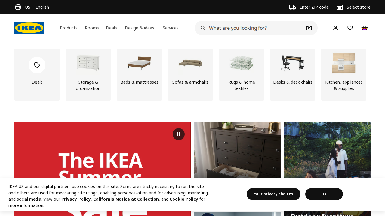 A clean e-commerce homepage with category tiles, featured promotions, and a prominent search bar.