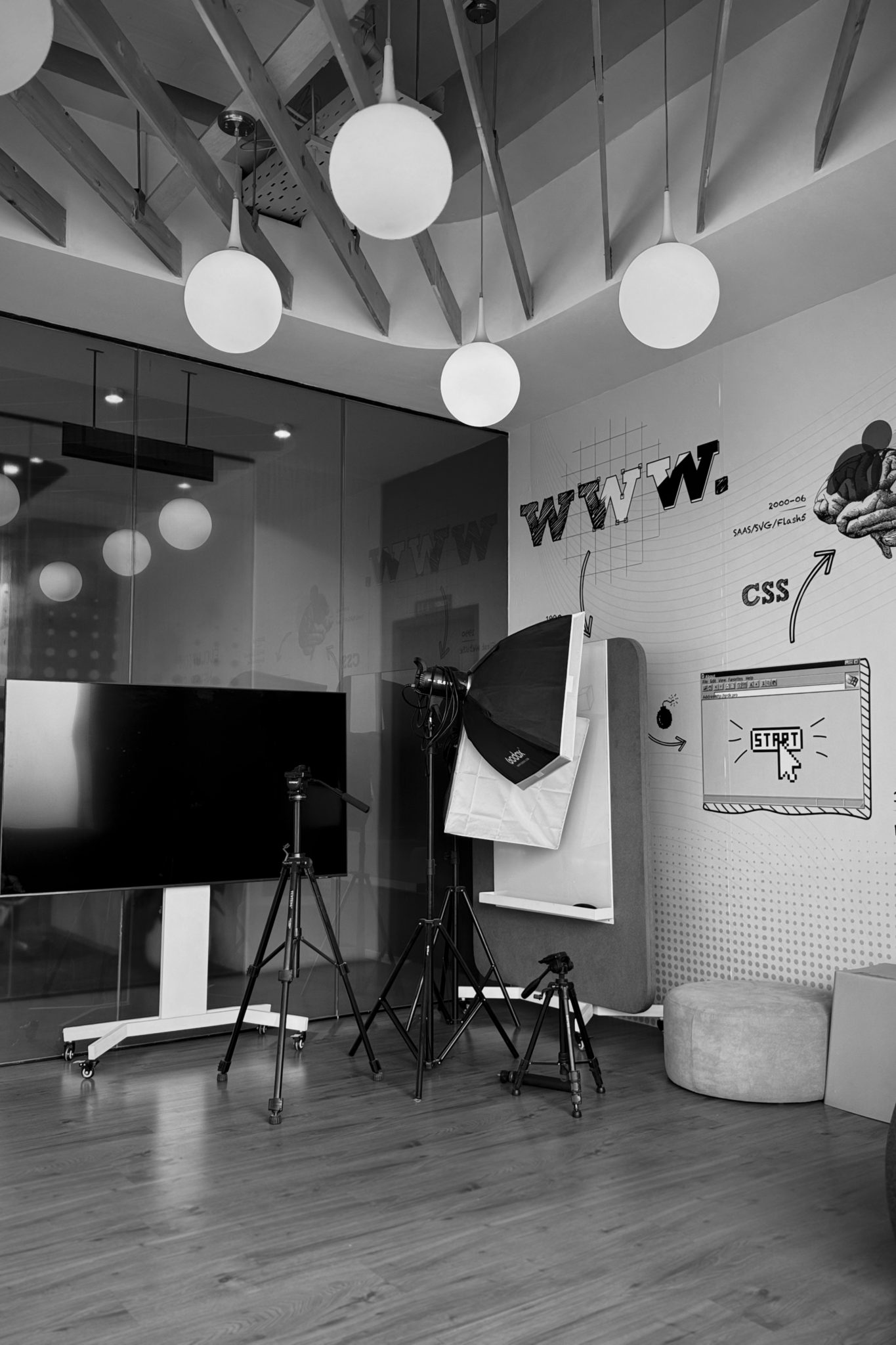 Workspace with large screen and web design layout elements